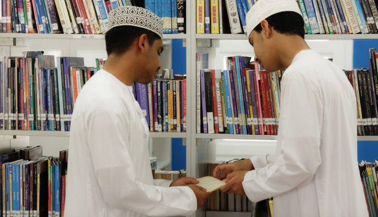 male students in library